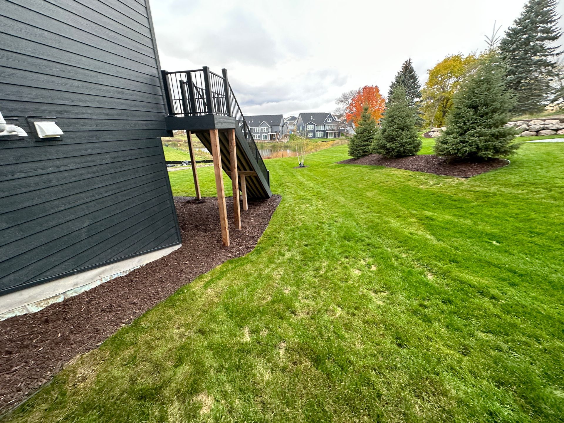 Sloped area of yard unusable space.