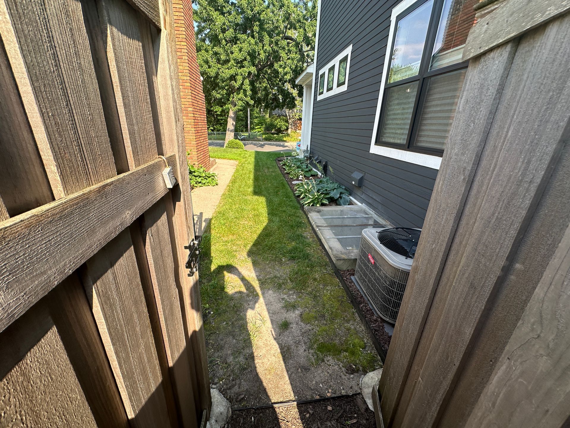 Narrow flat side yard poor drainage situation 