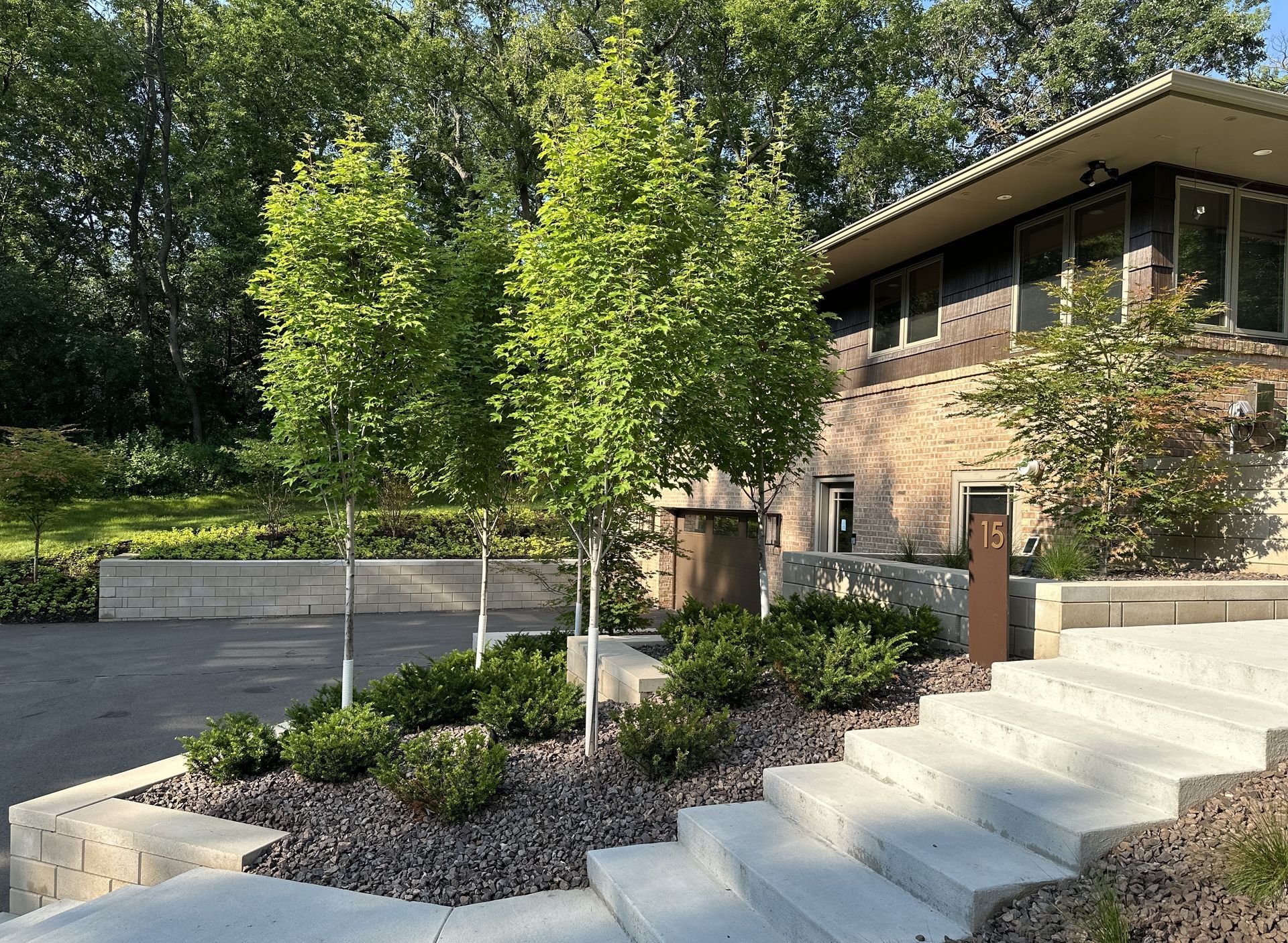 Front+yard+landscaping+mid+century+modern+design+hill+sloped+yard+with+steps+retainging+walls+MN+KG+Landscape