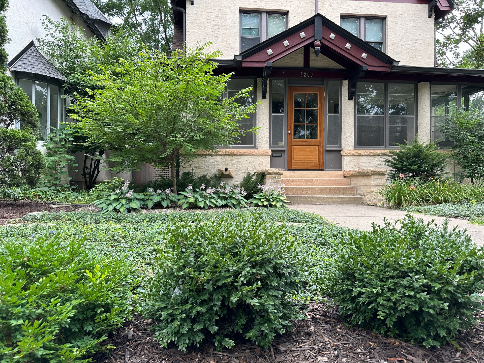 Front yard landscaping with ground cover lawn in Minneapolis by KG Landscape