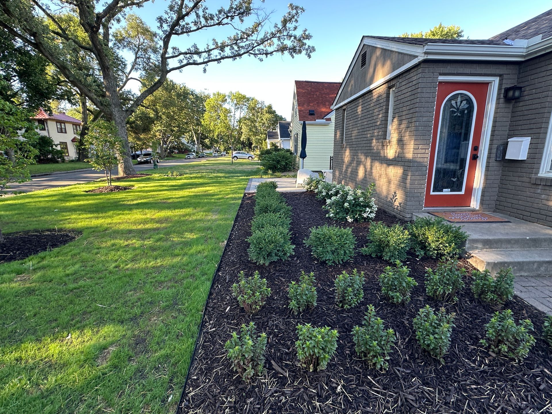 The new front yard feature nicely accents the front door as well.