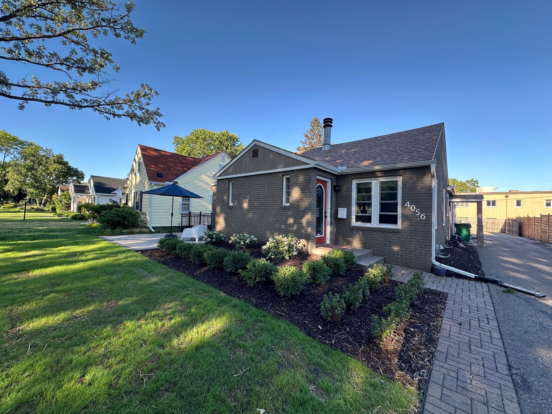A 45-degree angle view of the front of a house.