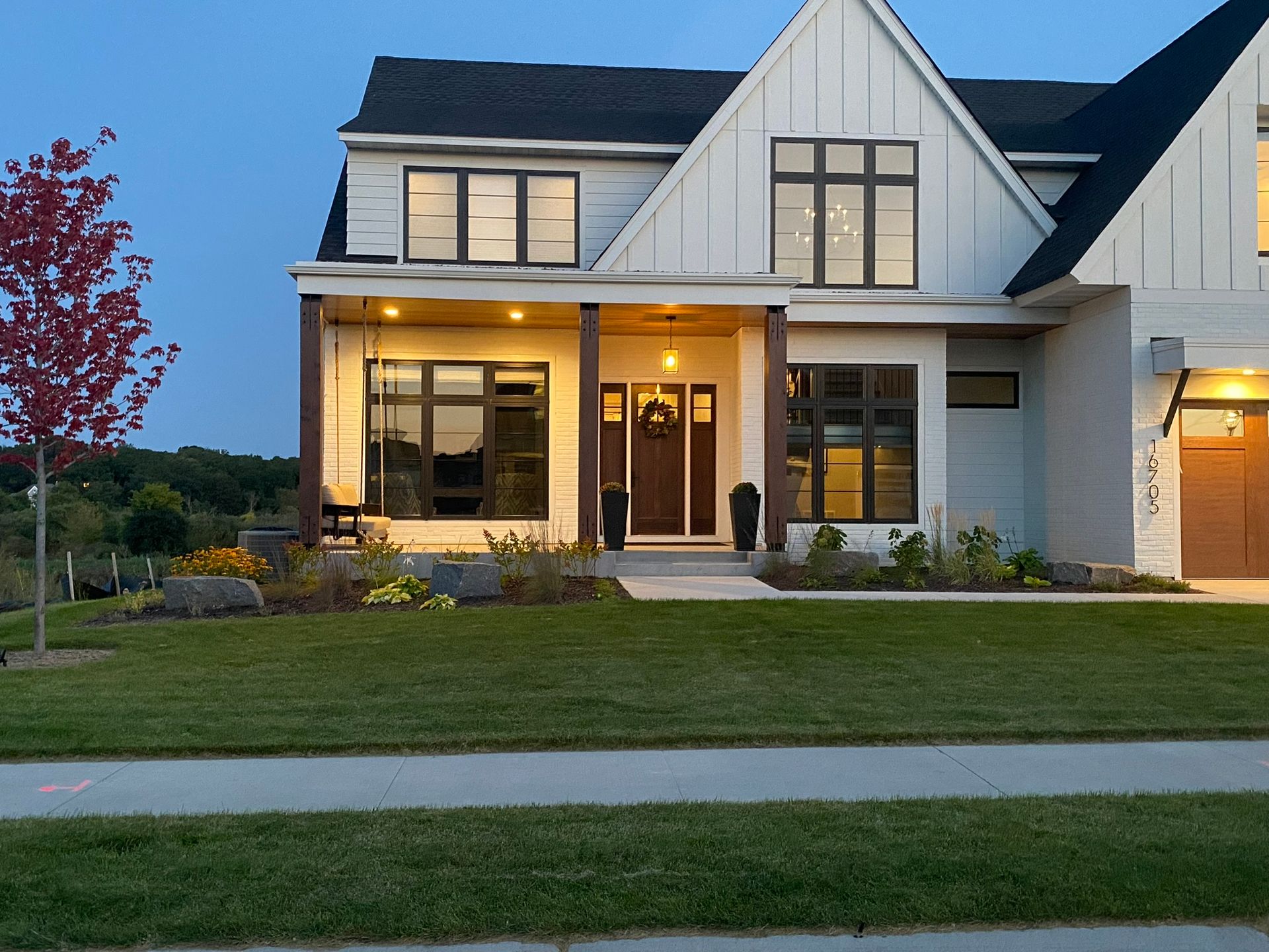 simple cheap clean looking front yard landscaping with perennials and boulders Plymouth MN KG Landscape 