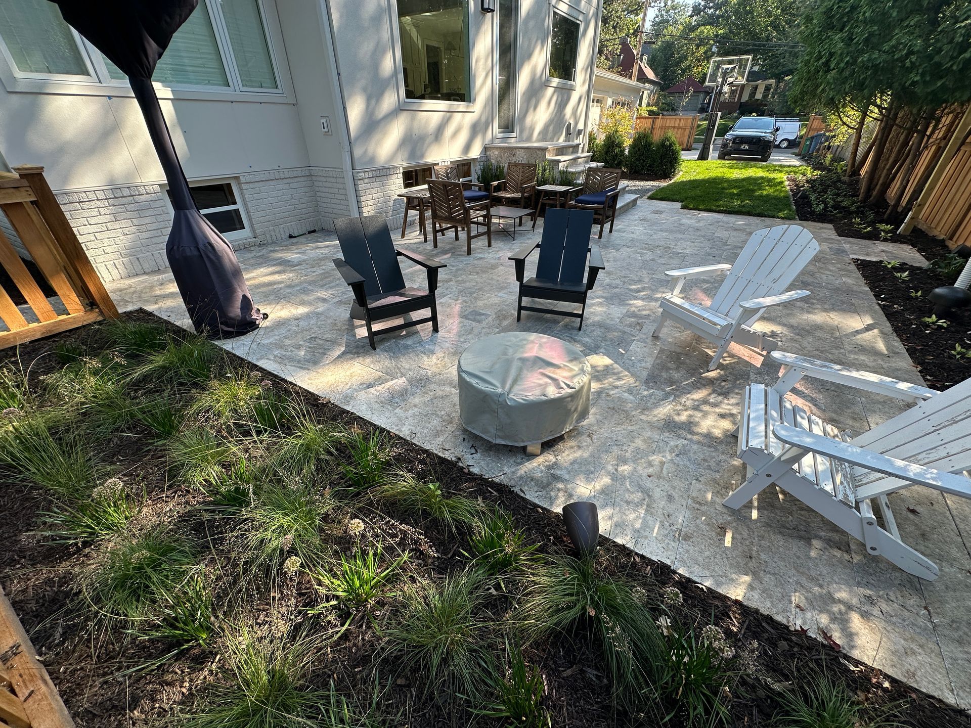 Landscaping+design+small+backyard+patio+with+fire+ring+and+table+in+Minneapolis+MN+KG+Landscape.