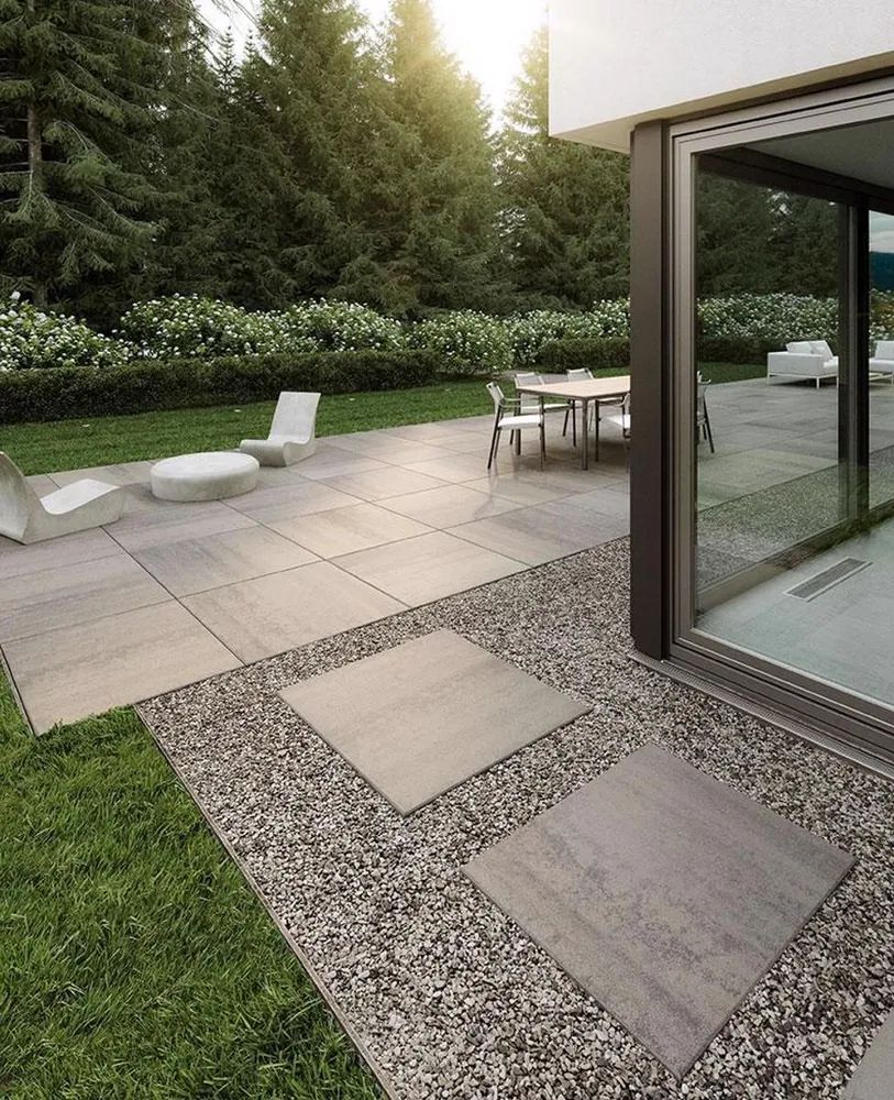modern gray patio large square stones gravel and stepping stone pathway MN 