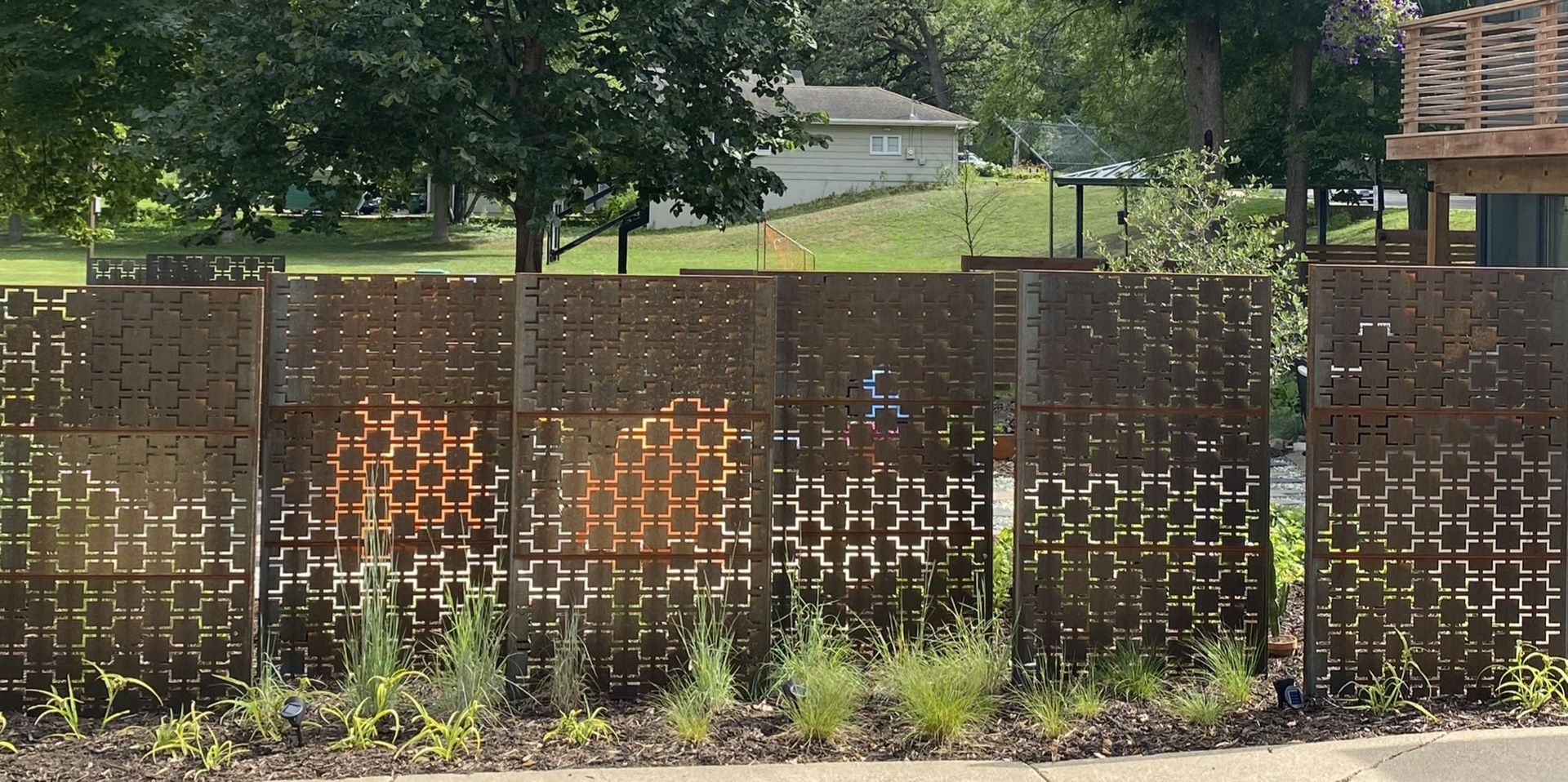 Mid+Century+modern+Corten+Steel+Privacey+panels+between+driveway+and+patio+St.+Louis+Park+MN+KG+Landscape+Design