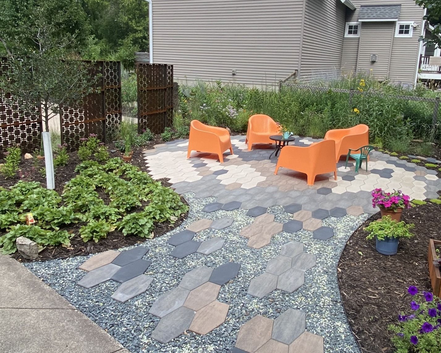 Mid+Century+modern+patio+fire+ring+with+chairs+techo+bloc+with+corten+steel+screen+pannels+hexa+60+St.+Louis+Park+MN+KG+Landscape+Design