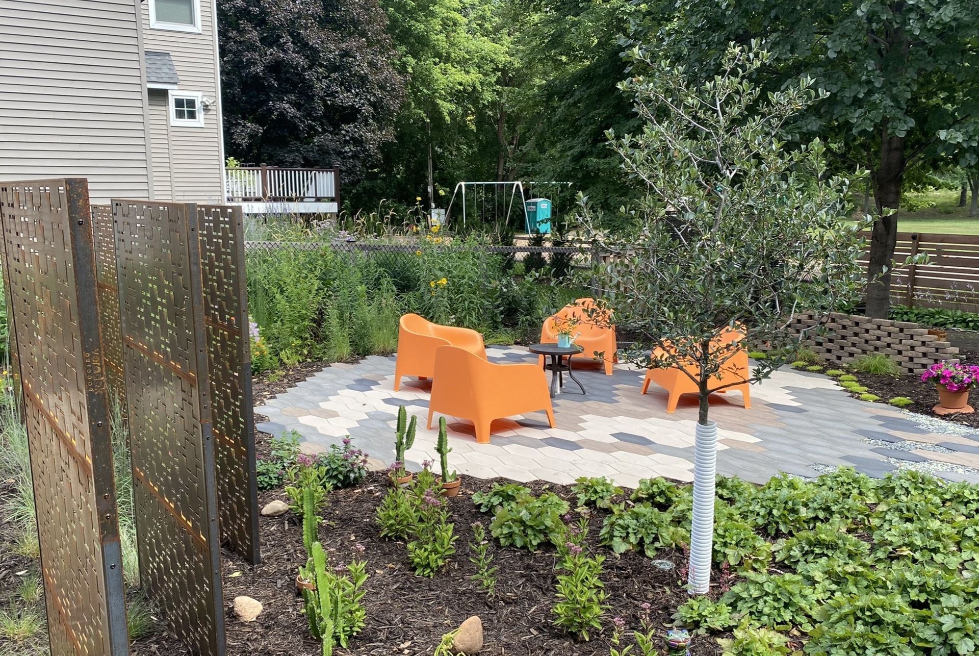 Mid+Century+modern+paver+patio+techo+bloc+with+corten+steel+screen+pannels+hexa+60+St.+Louis+Park+MN+KG+Landscape+Design