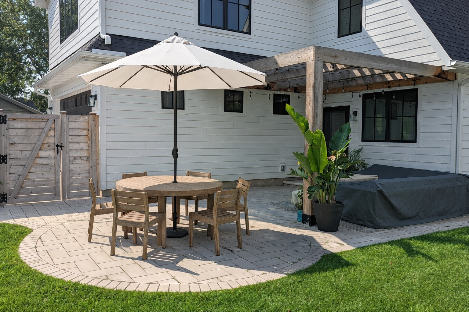 modern patio with pergola outdoor living space in Edina 