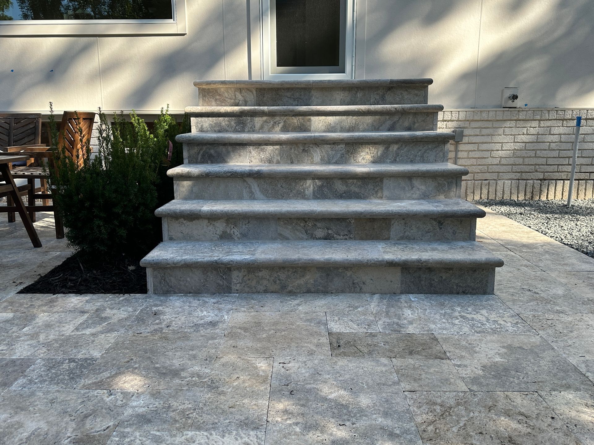 Natural+stone+patio+with+custom+stone+stairs+stoop+landing+in+Minneapolis+MN+KG+Landscape