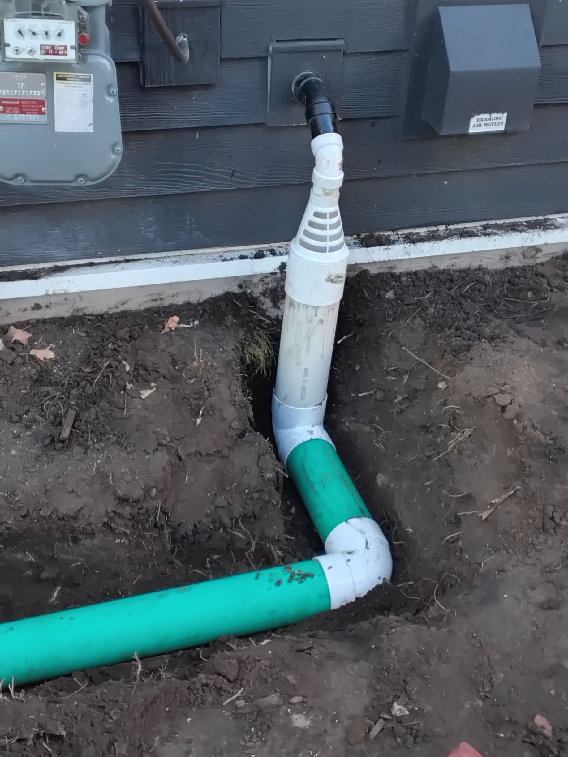 During: KG installed a new PVC sump pump discharge