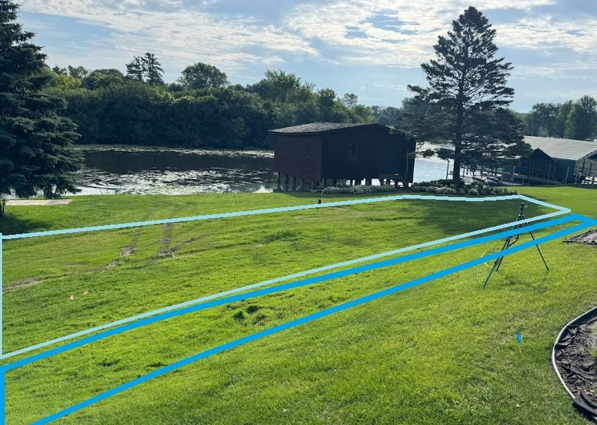 Wet lawn area in Minnetonka marked in Blue with microsoft paint by KG Landscape