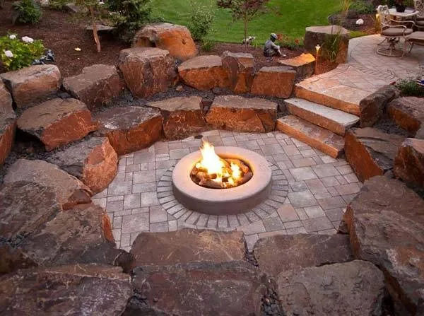 boulder-outcropping-sitting-seating-rocks-sunken-fire-pit-patio-steps-landscaping-design-mn