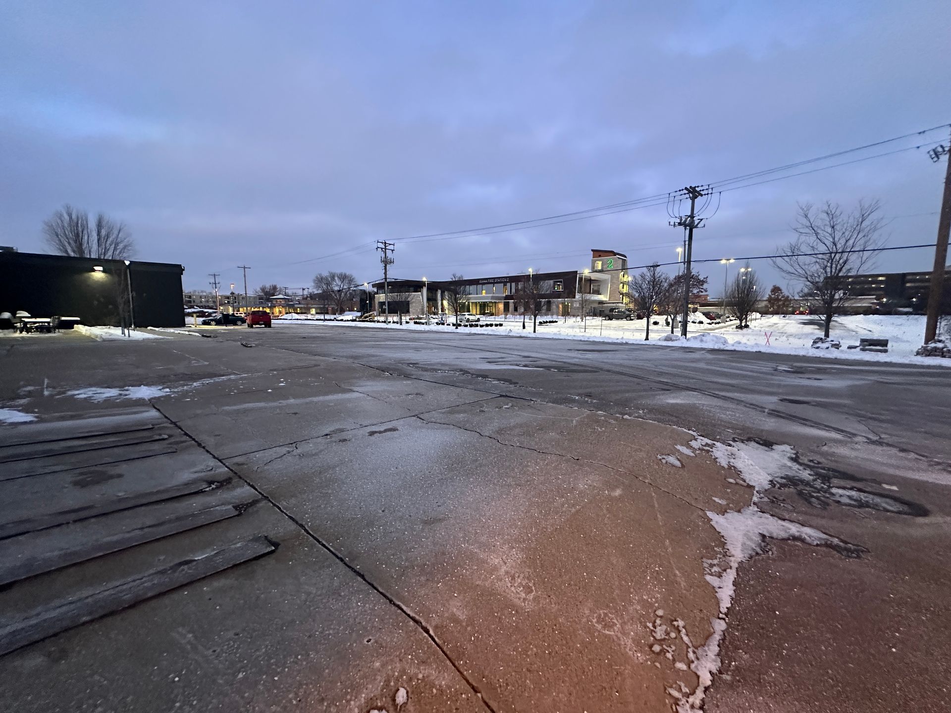 Snow plowing by KG Landscape crew at a business in Edina, MN