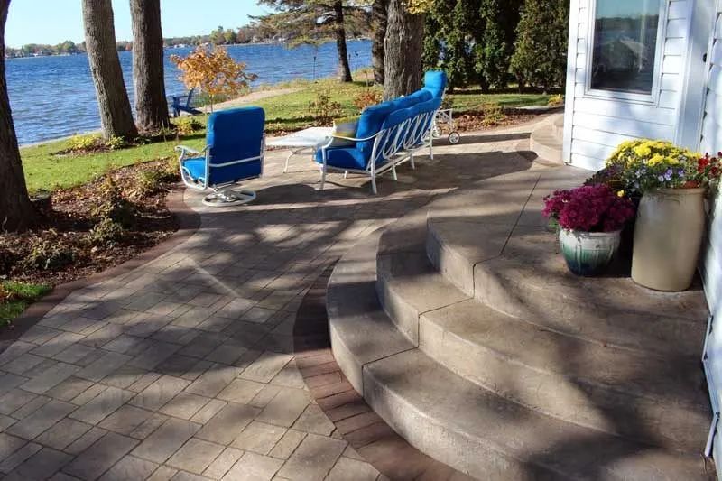 Curved patio with rounded half circle steps designed by KG Landscape Forest Lake MN sitting area 