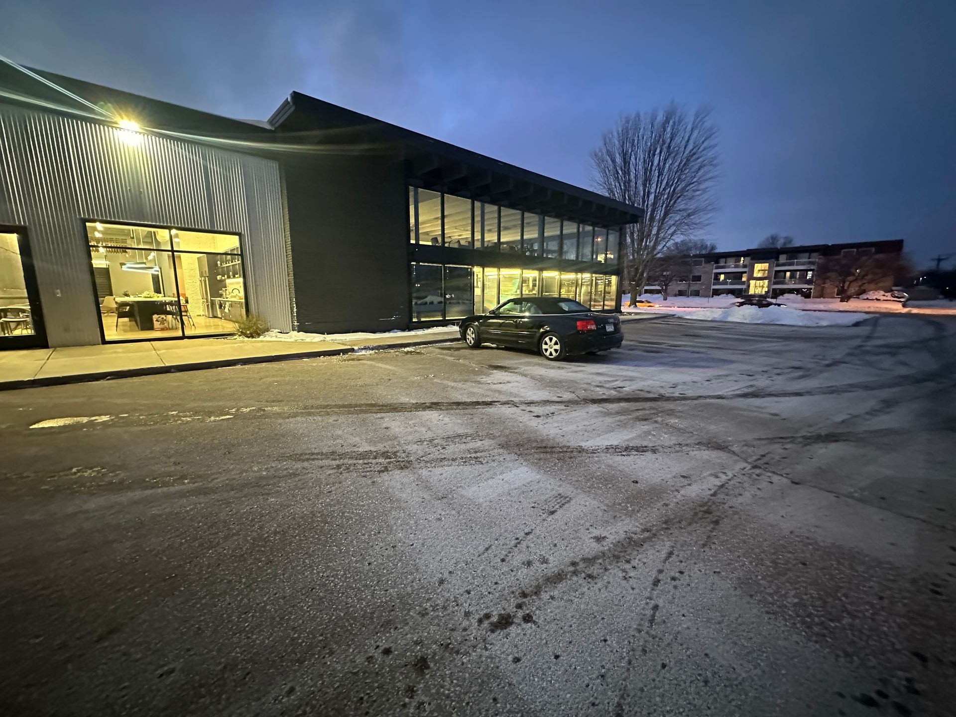 Perfectly shoveled and salted sidewalks at a commercial entrance in Minnesota