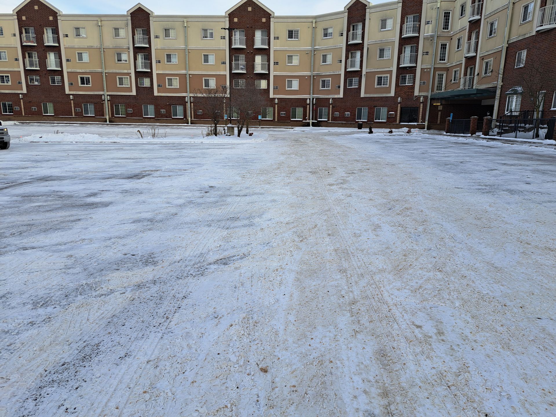 Snow plowed apartment parking lot in Blaine, MN