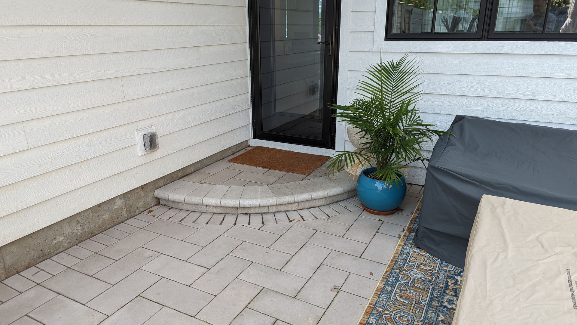 After photo of quarter circle step leads into the backdoor.