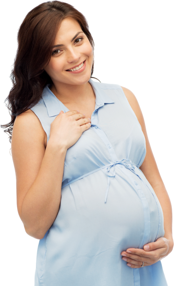 A pregnant woman in a blue dress is holding her belly and smiling.