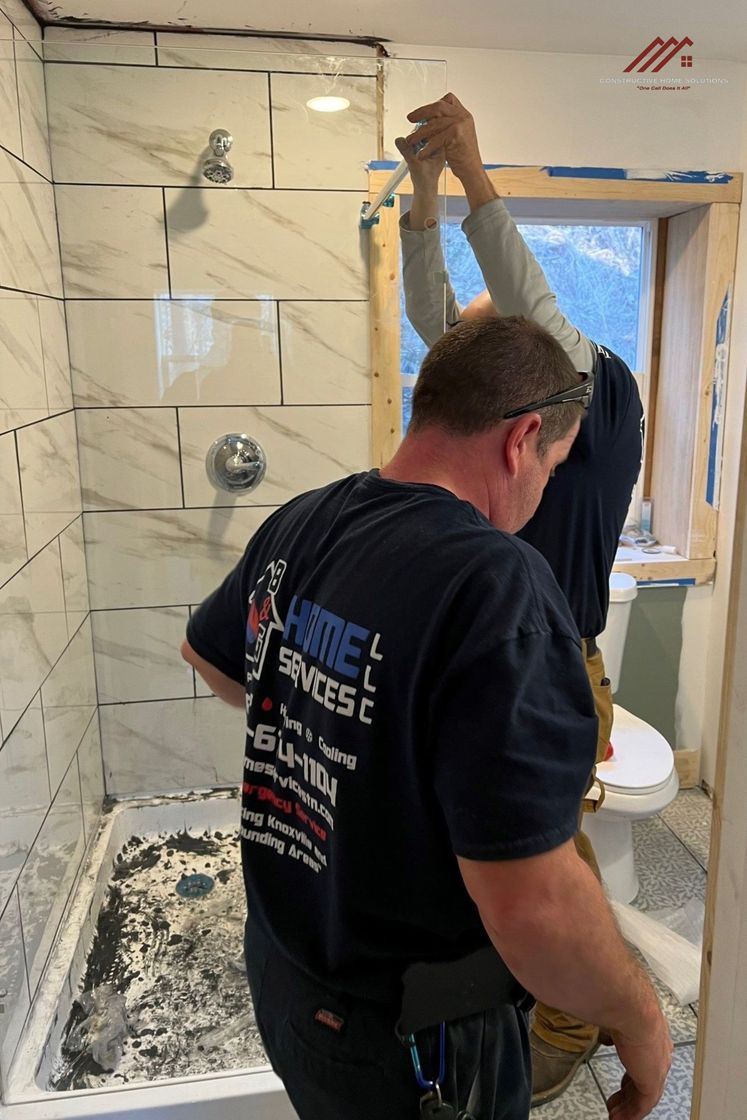 Photo showing Constructive Home Solutions team working on a bathroom remodel