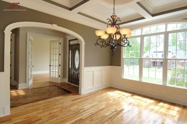 A warm and inviting living room transformed by Constructive Home Solutions