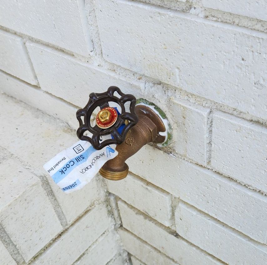 Water faucet with a blue and white 