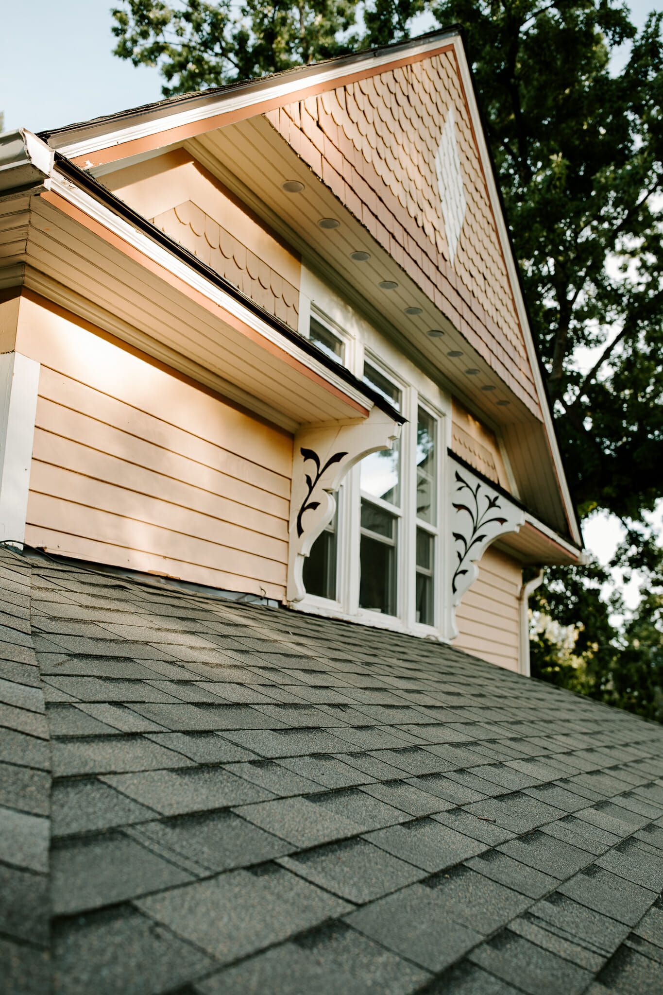 A house with a roof that has shingles on it