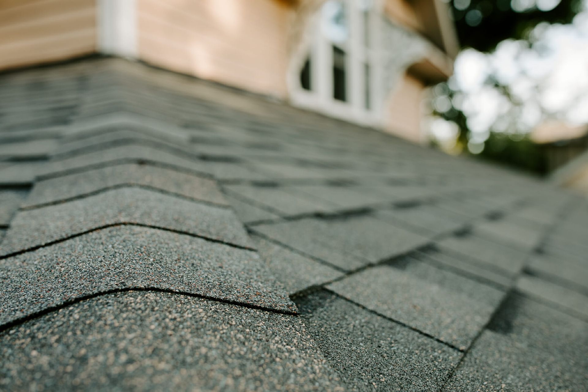 A close up of a roof with shingles on it.