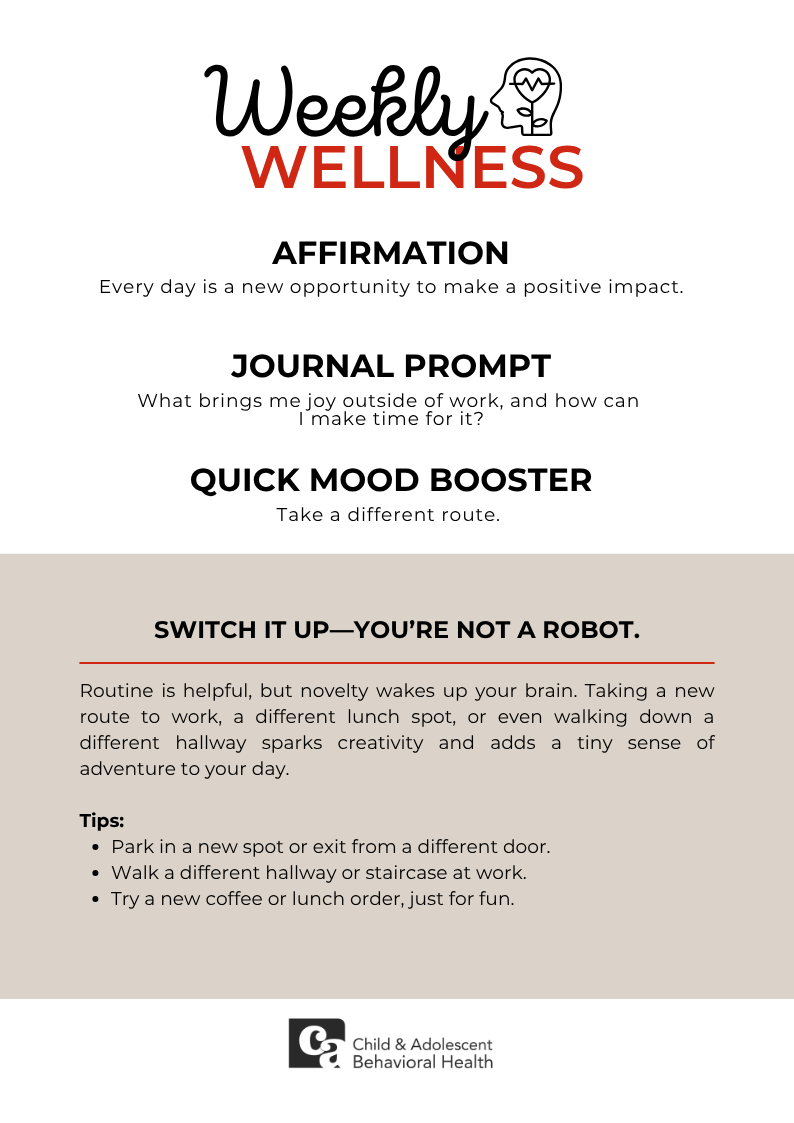 Woman in teal shirt, smiling with eyes closed, holding a red heart against a pink background.