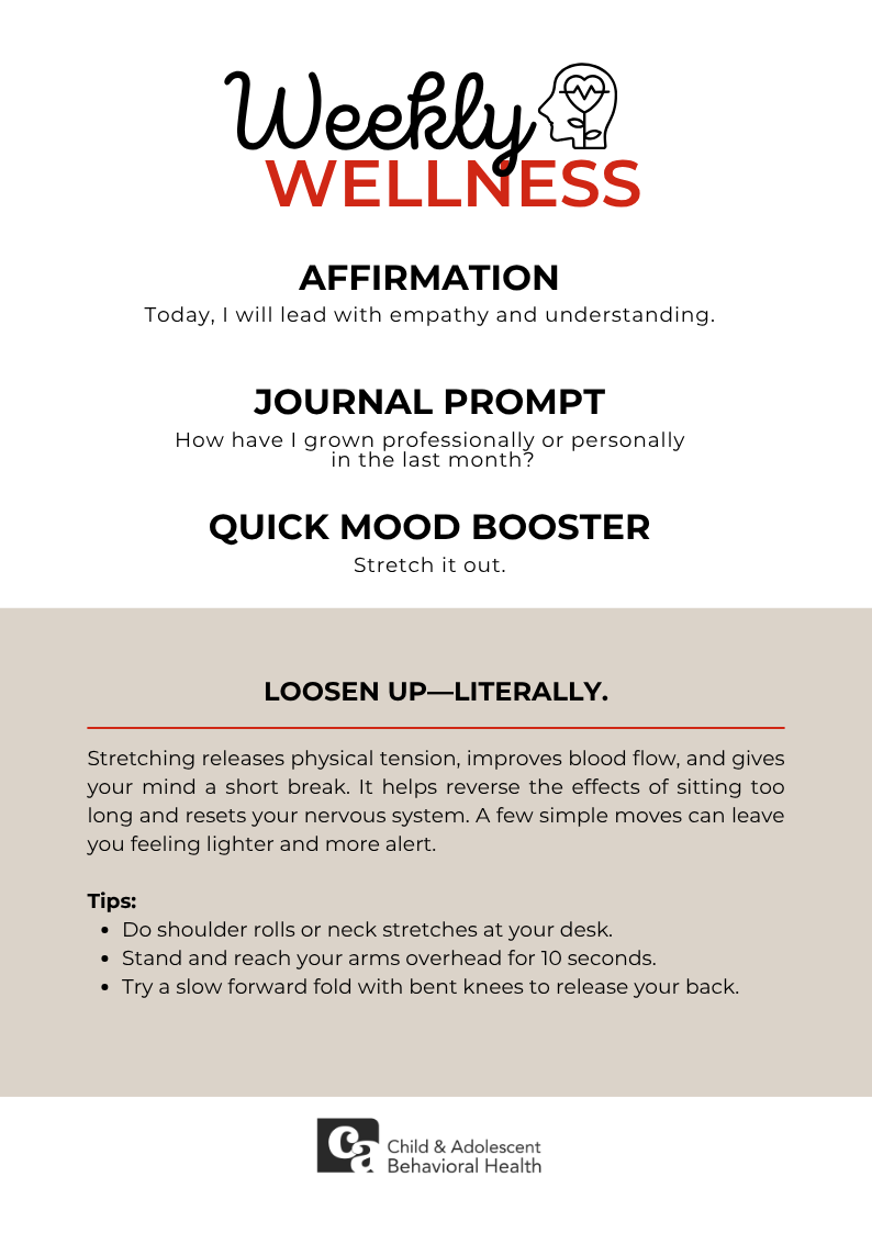 Woman in teal shirt, smiling with eyes closed, holding a red heart against a pink background.