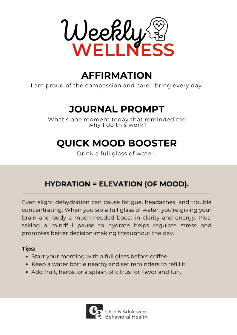 Woman in teal shirt, smiling with eyes closed, holding a red heart against a pink background.