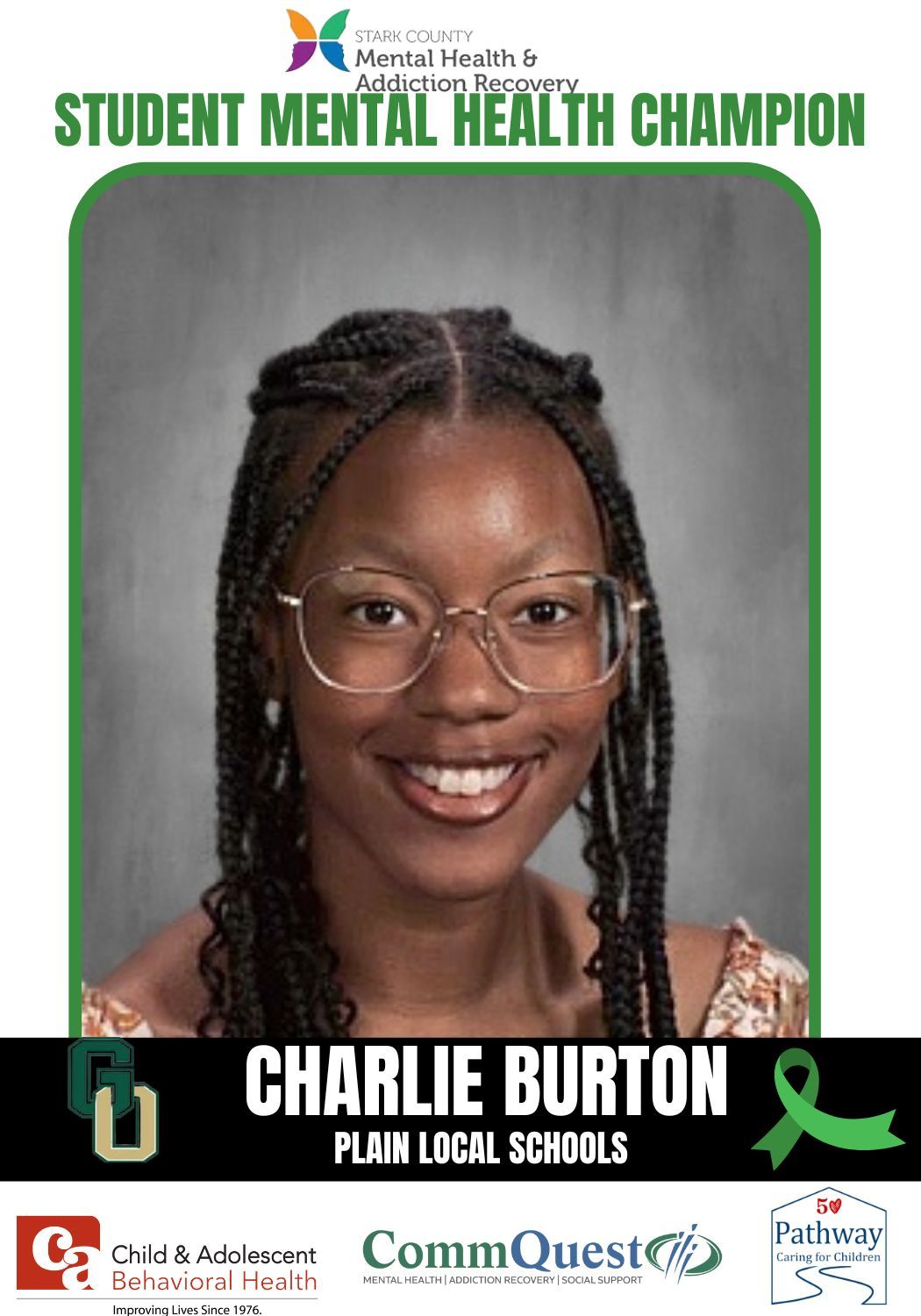 Charlie Burton, student mental health champion, wearing glasses, smiling.