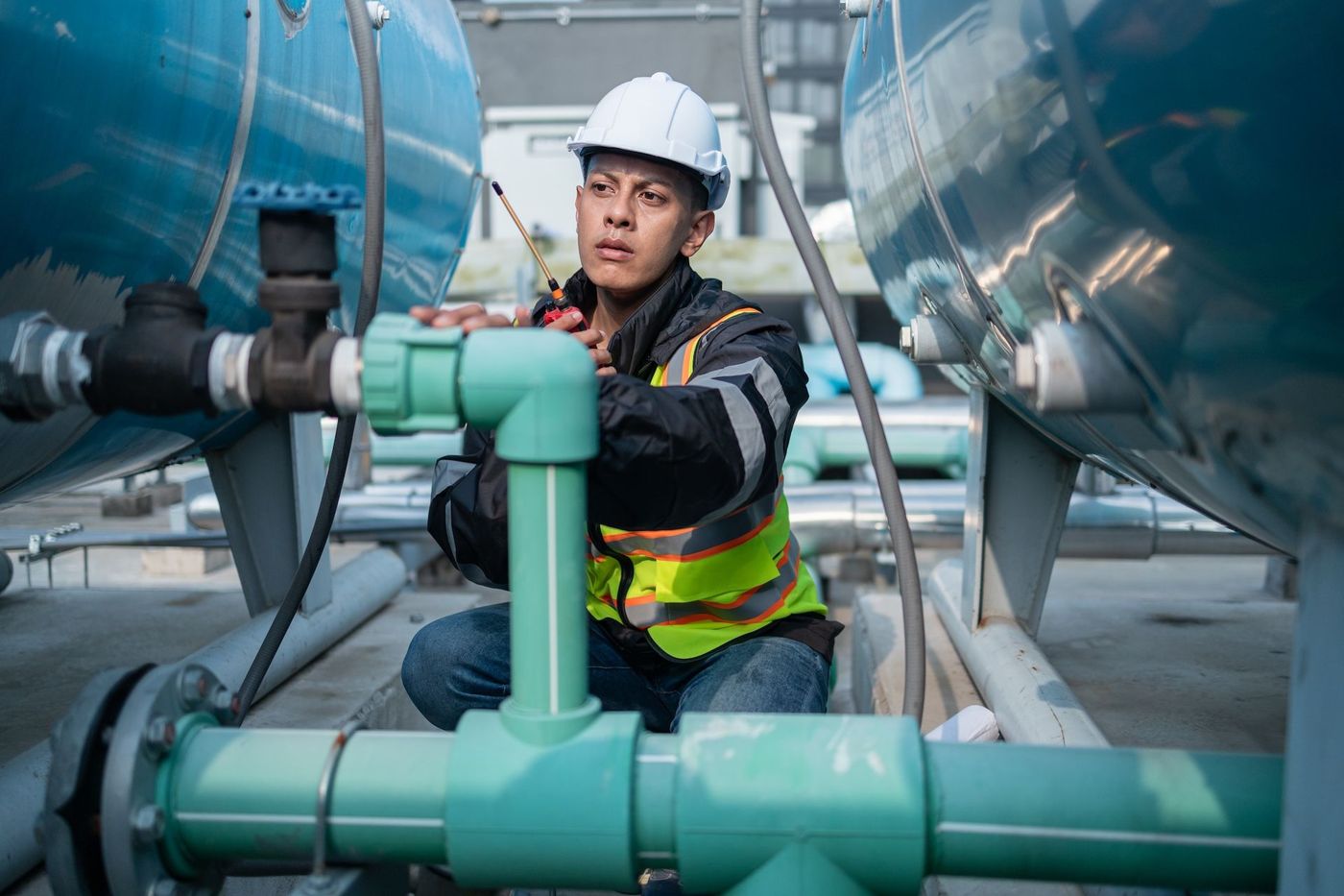 environmental Engineer is inspecting pipes.
