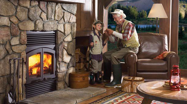 Grandfather and child next to large fireplace — Freehold, NJ — Fireside Pros