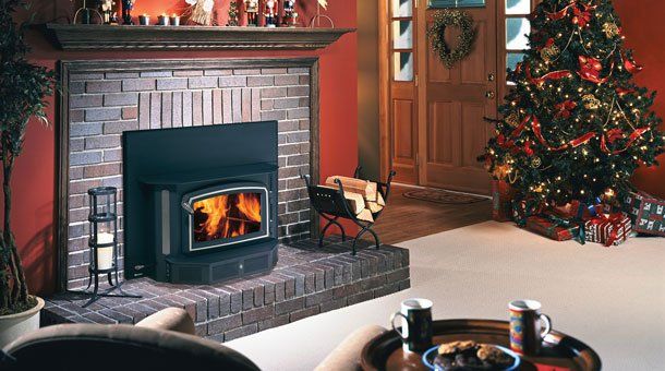 Small wood insert on house with Christmas tree — Freehold, NJ — Fireside Pros