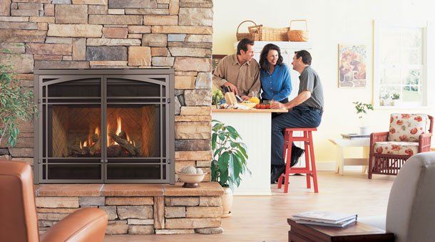 Family with fireplace at house — Freehold, NJ — Fireside Pros