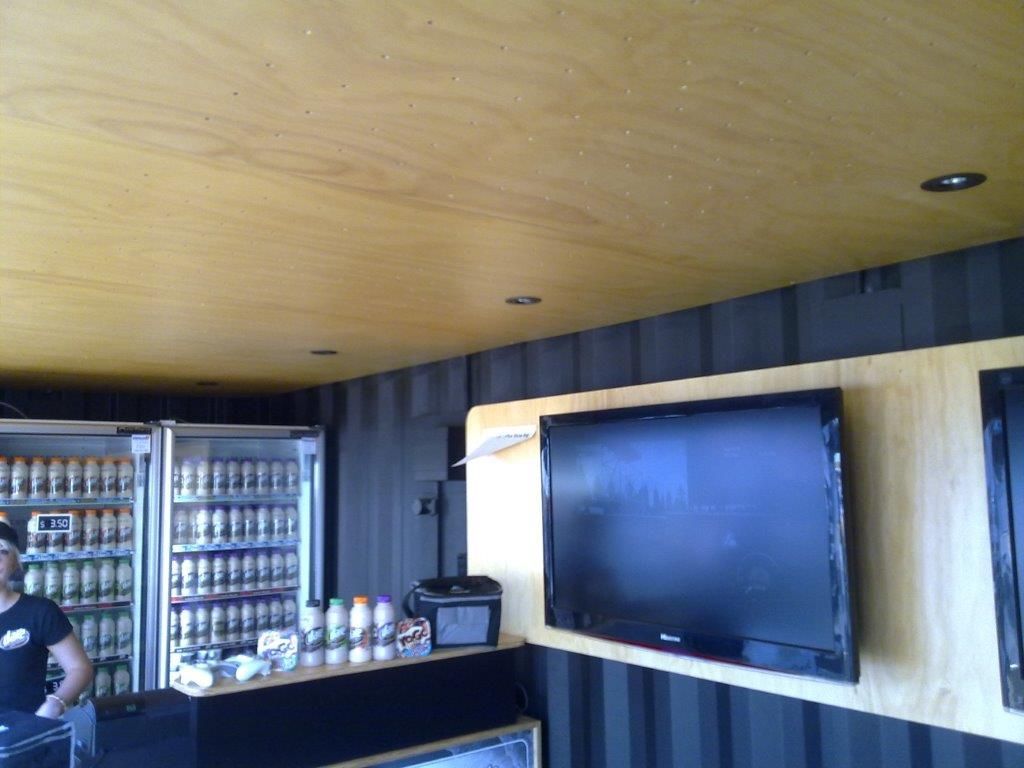 TV and Refrigerator on Container Storage — Palm Beach, QLD — Container Kitchens & Shops