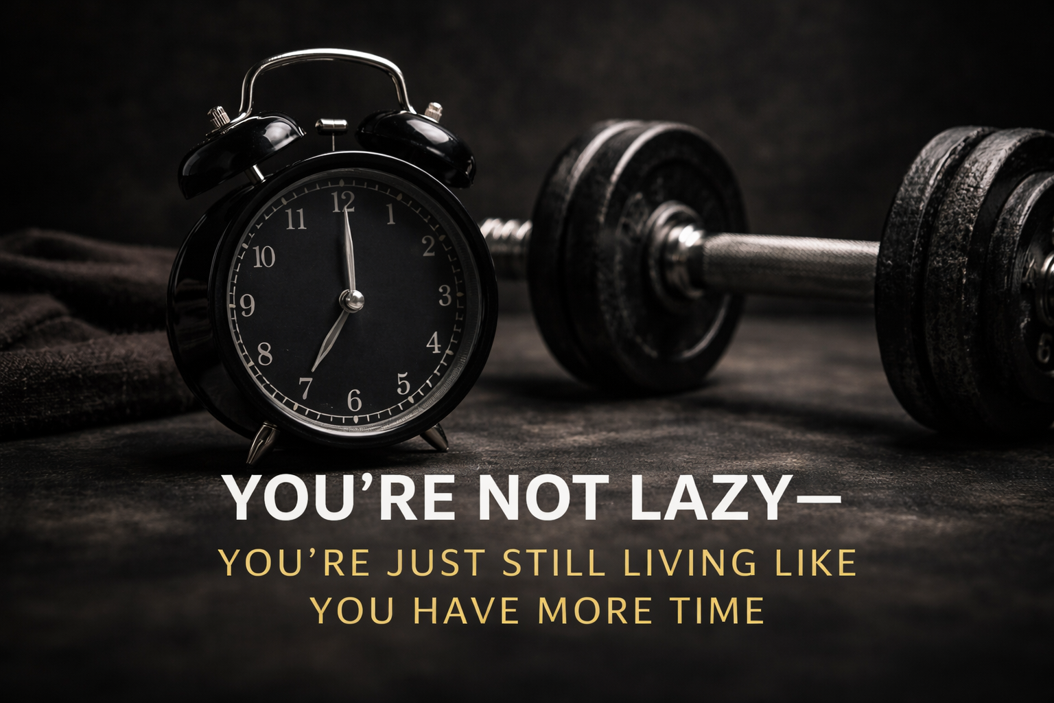 Black alarm clock and dumbbell with text: 