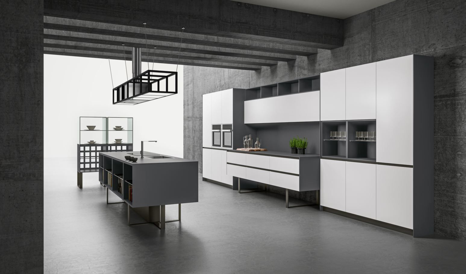 Cucina moderna Aran grigia e bianca con isola, mobili e pareti in cemento.