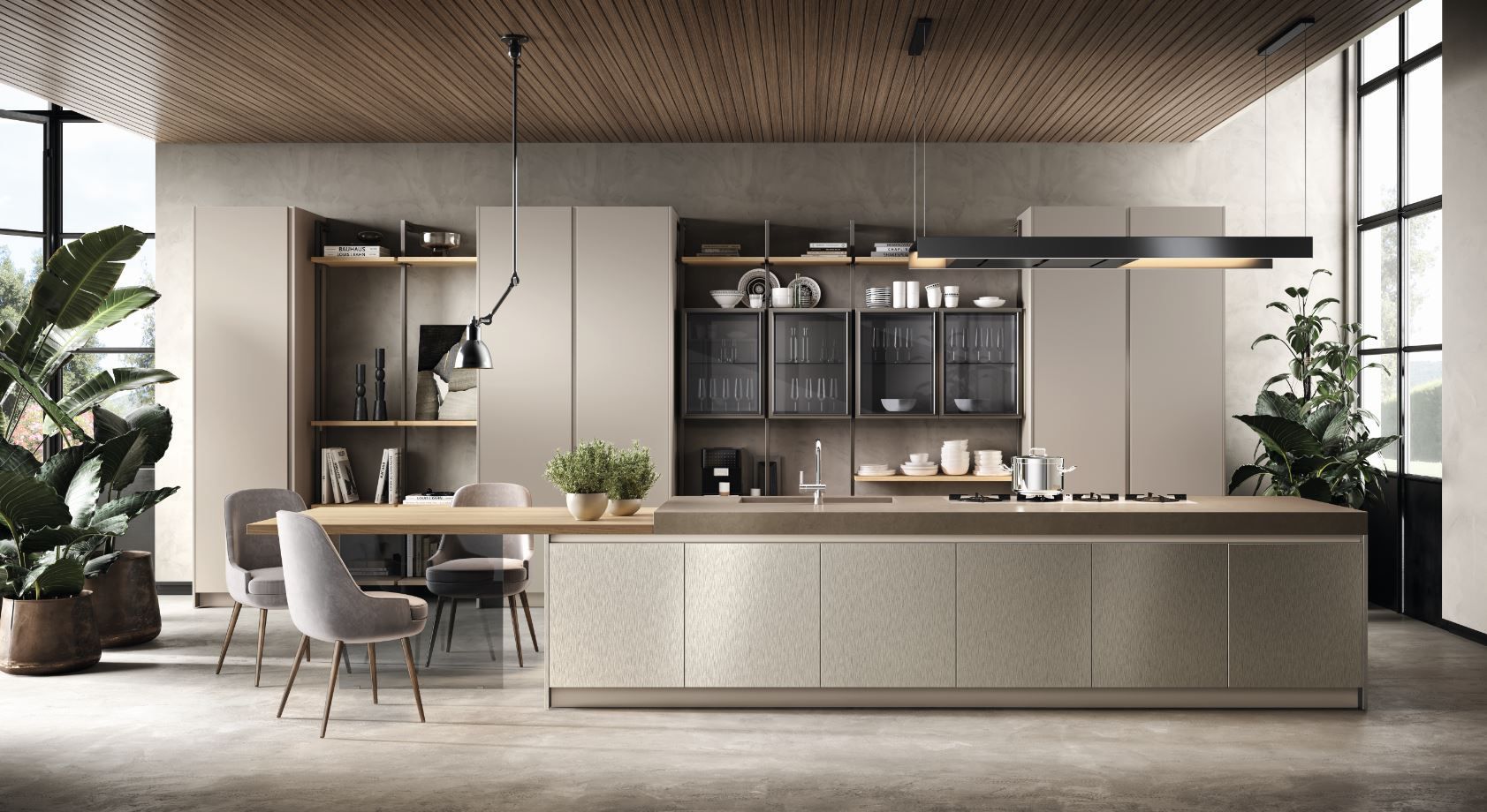 Moderna cucina open space con mobili bianchi, pavimenti in legno scuro e una scaffalatura che separa la zona pranzo dal soggiorno.