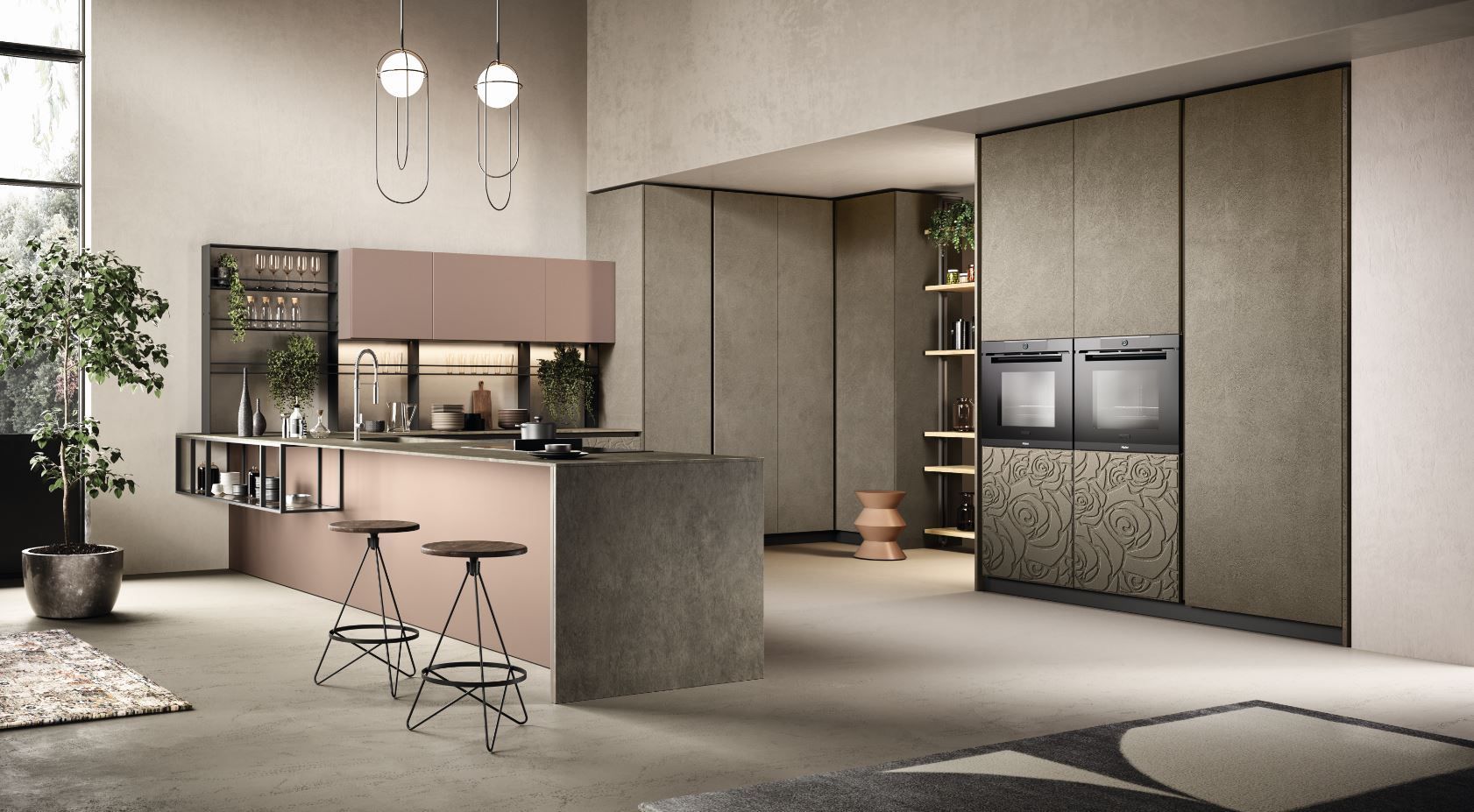 Cucina moderna Moretti Compact con isola, mobili rosa, forni da incasso e una tavolozza di colori neutri.