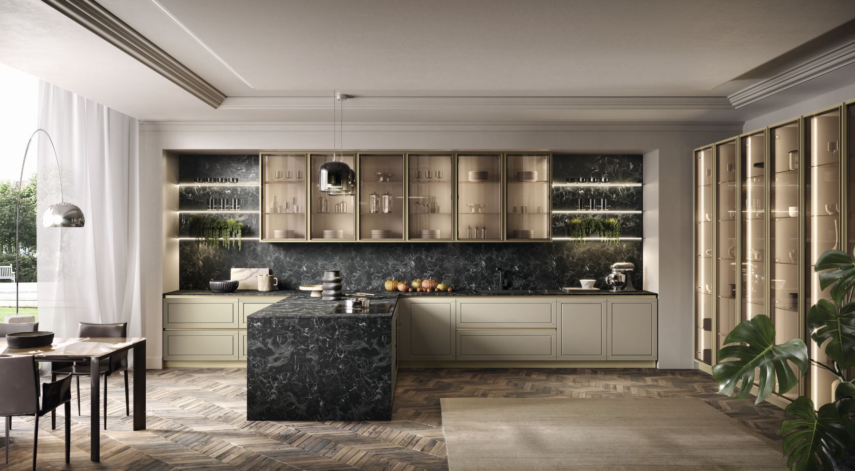 Cucina moderna con isola in granito nero e mobili color crema, tavolo da pranzo e ampie finestre.