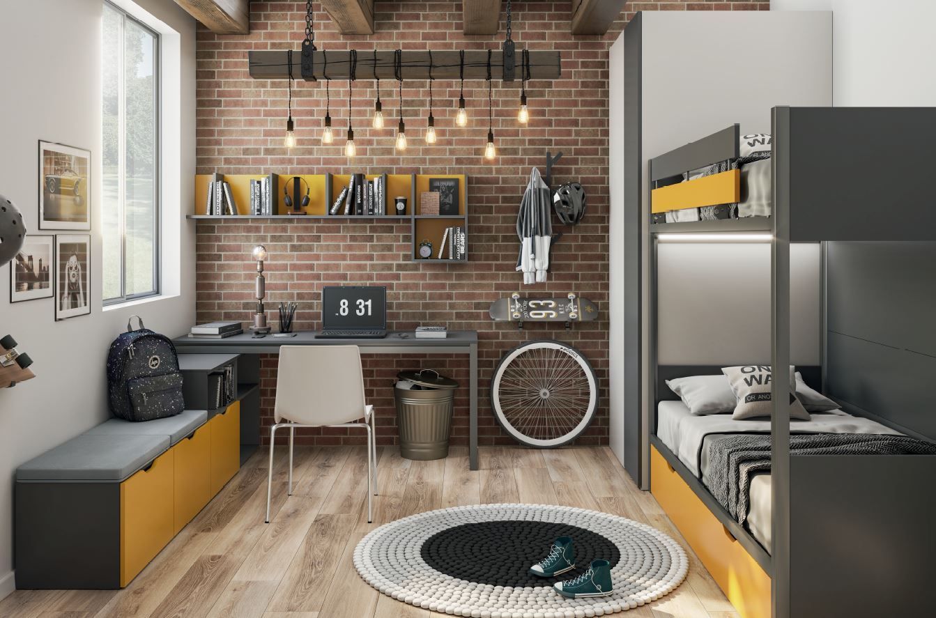 Camera da letto moderna con letto a castello, scrivania, parete con mattoni a vista e dettagli gialli.