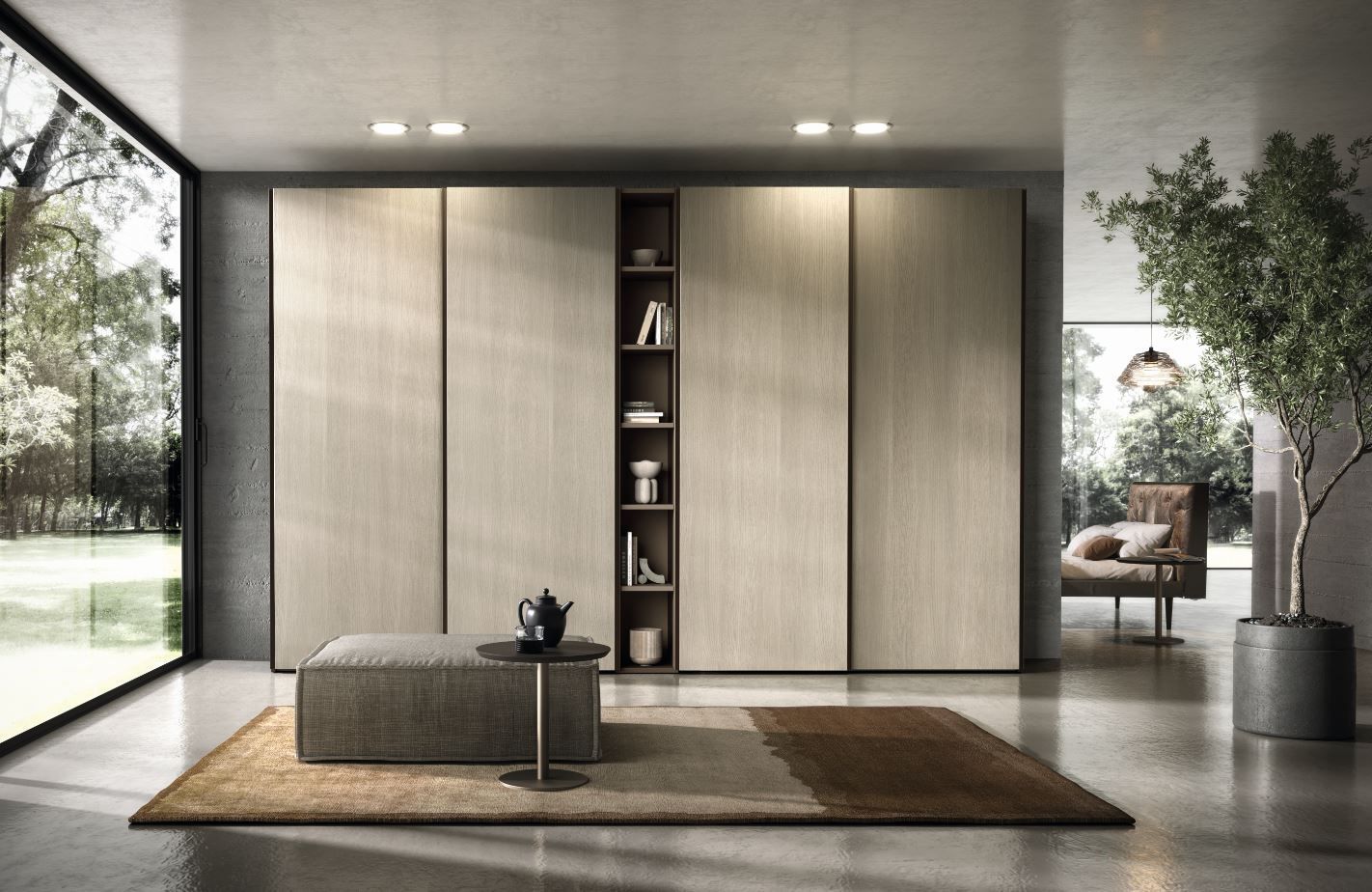 Camera da letto moderna con ampio armadio, toni neutri e vista sull'esterno.