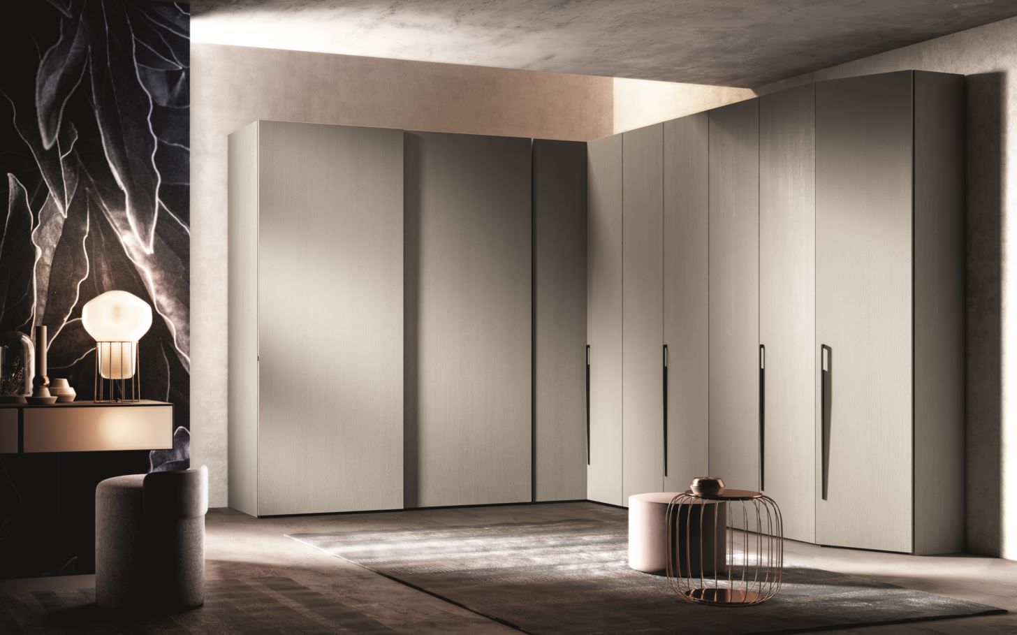 Camera da letto moderna con ampi armadi dai colori chiari e zona trucco.