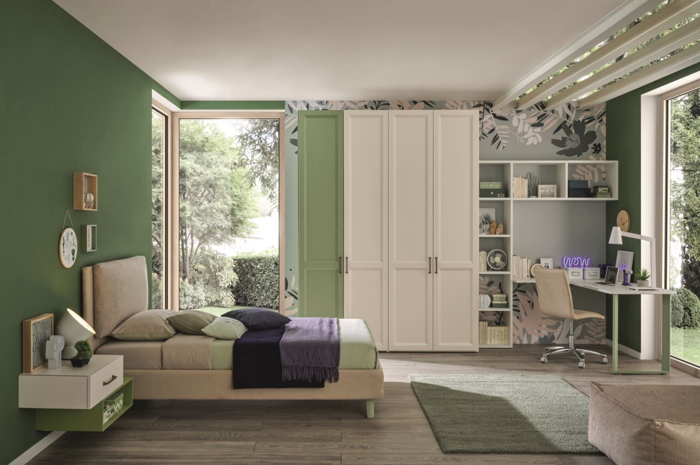 Camera da letto con letto, armadio, scrivania, pareti verdi, ampie finestre con vista sul giardino.