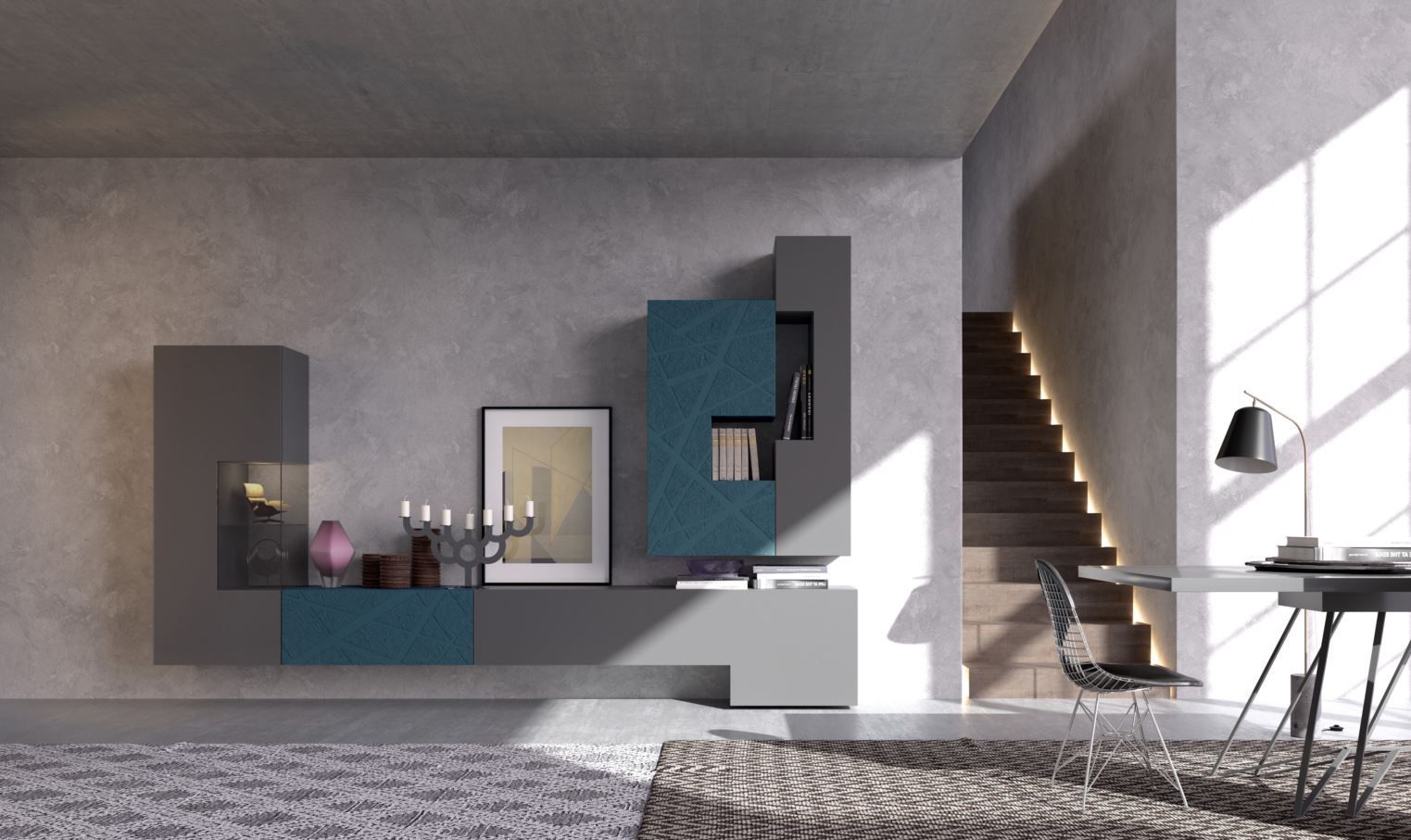 Soggiorno moderno con parete attrezzata grigia e verde acqua. Scala e tavolo con lampada e sedia.