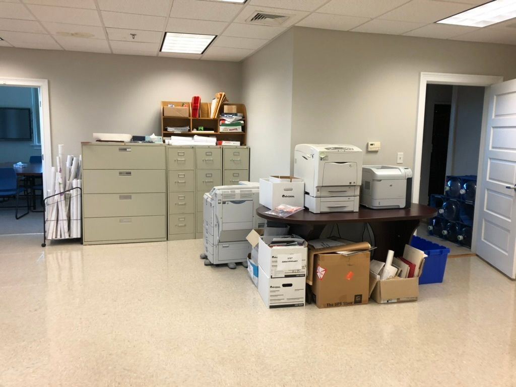 Clean and organized office file room maintained through commercial cleaning services in Barnstable, MA.