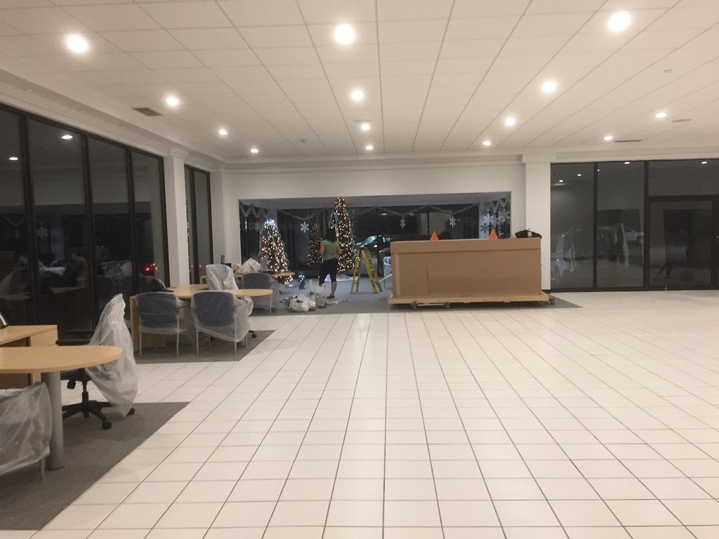 Clean, polished office lobby space with holiday decorations after professional commercial cleaning in Barnstable, MA.