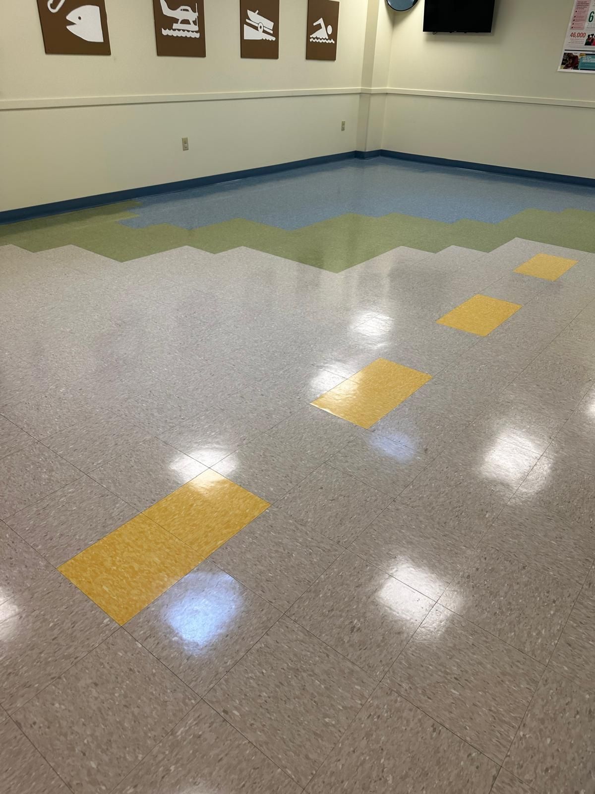 Shiny, polished vinyl floors in a children’s waiting area cleaned by ASA Janitorial